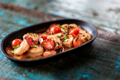 Close-up of shrimp tomato tapas dish