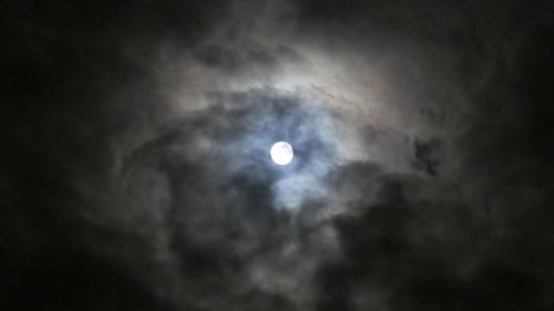 Low angle view of moon in sky