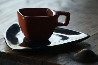 Close-up of coffee cup on table