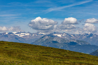 Scenic view of snowcapped mountains against sky