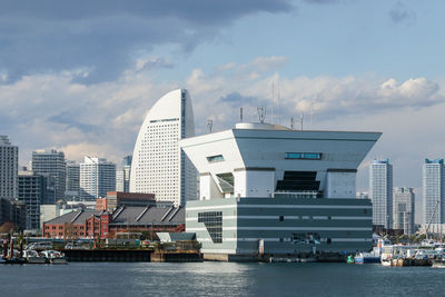 Modern buildings in city against sky