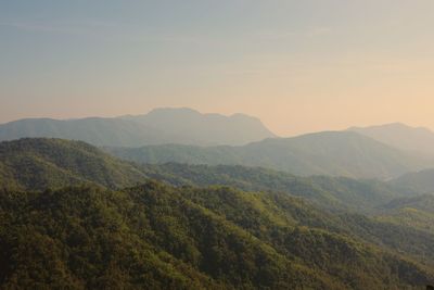 Scenic view of mountains against sky during sunset