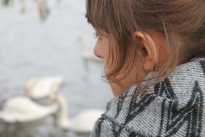 Close-up of girl with water