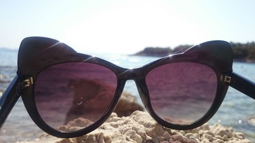 Close-up of railing against the sky