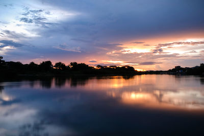 Scenic view of lake against sky during sunset