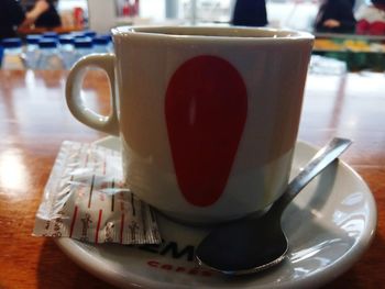 Close-up of coffee cup on table