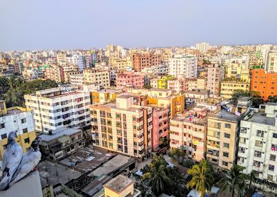 High angle view of buildings against clear sky