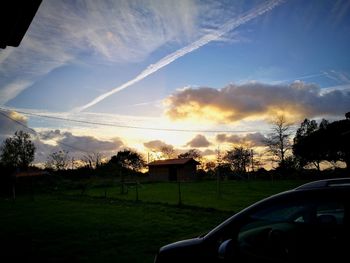 View of landscape against cloudy sky