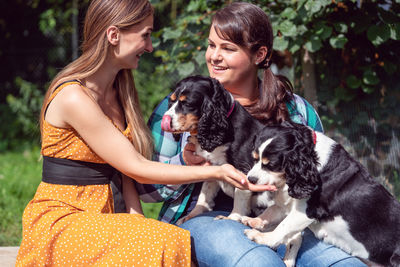 Two people with dogs