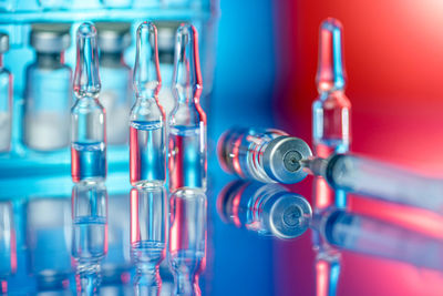 Close-up of glass bottles on table