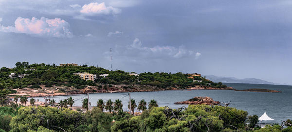 Scenic view of bay against sky