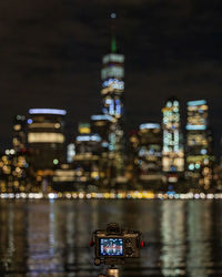 Illuminated buildings in city at night