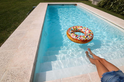 High angle view of man and woman in swimming pool