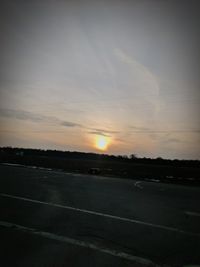 Scenic view of landscape against sky during sunset