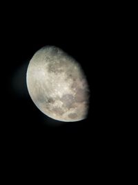 Scenic view of moon against black sky