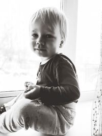 Portrait of cute boy at home