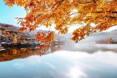 Scenic view of lake against sky during autumn