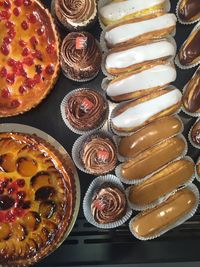 Directly above shot of various dessert at shop