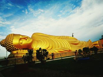 Statue of temple against sky