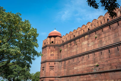 Low angle view of historic building against sky