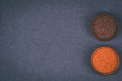 Directly above shot of bread on table against black background