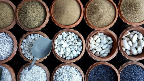 Full frame shot of spice and rock salt in containers for sale