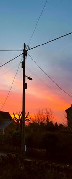 Electricity pylon at sunset