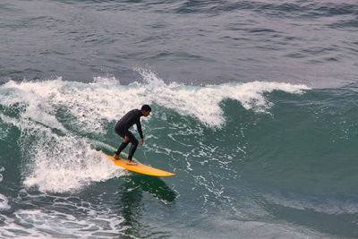 Man surfing in sea