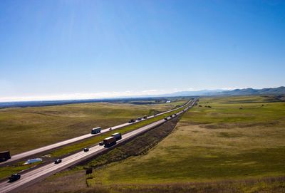 Scenic view of landscape against clear blue sky