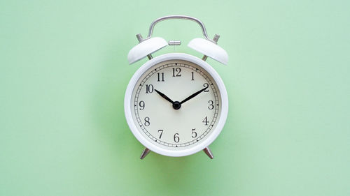 Close-up of clock on wall