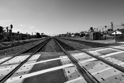 High angle view of railroad tracks against clear sky