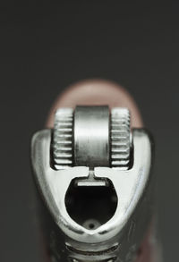 Close-up of electric lamp against black background