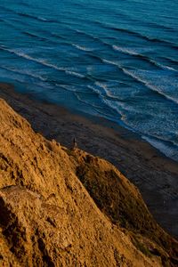 High angle view of sea and rock formation