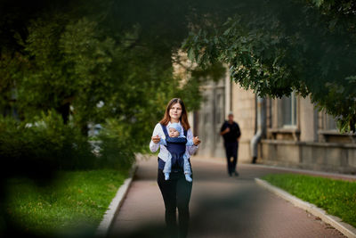 Full length of woman walking in park