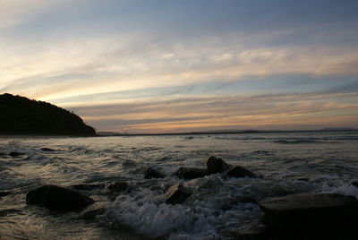 Scenic view of sea against sky during sunset