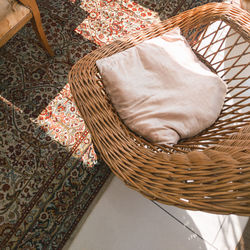 High angle view of wicker basket on table at home