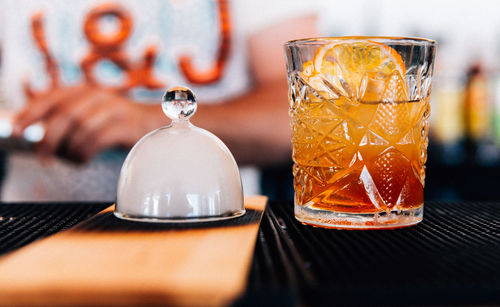 Close-up of whisky  in glass on table