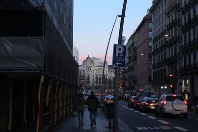 People on street in city