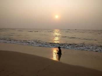 Scenic view of beach during sunset