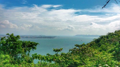 Scenic view of sea against cloudy sky
