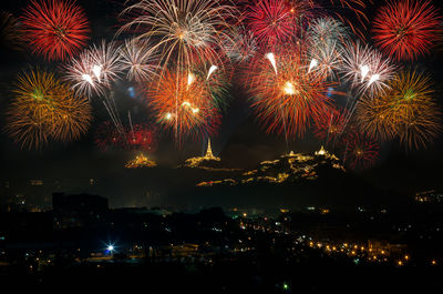 Firework display at night