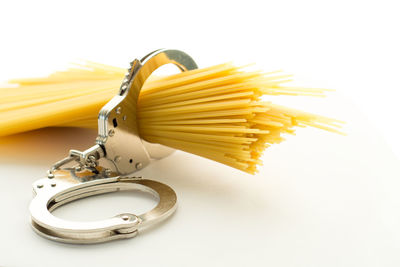 High angle view of pasta against white background