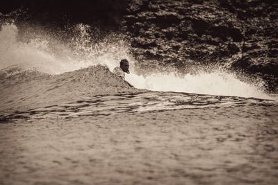 Man surfing in sea