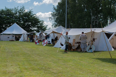 Tent on field against sky