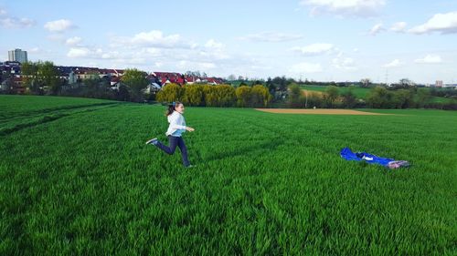 People on grassy field