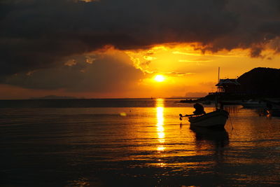 Scenic view of sea at sunset