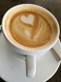 Close-up of cappuccino on table