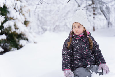 Portrait of a girl in snow