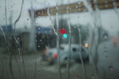 Wet glass window in rainy season