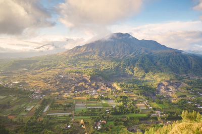 Aerial view of landscape and mountains against sky